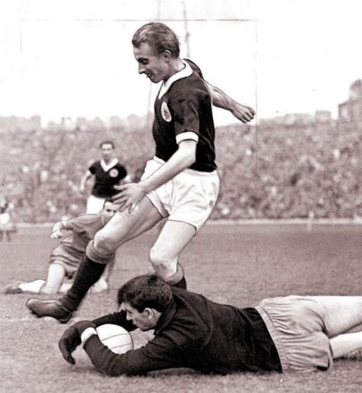 Denis Law playing for Scotland, 1965