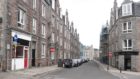 Police sealed off Raeburn Place as they investigated the incident