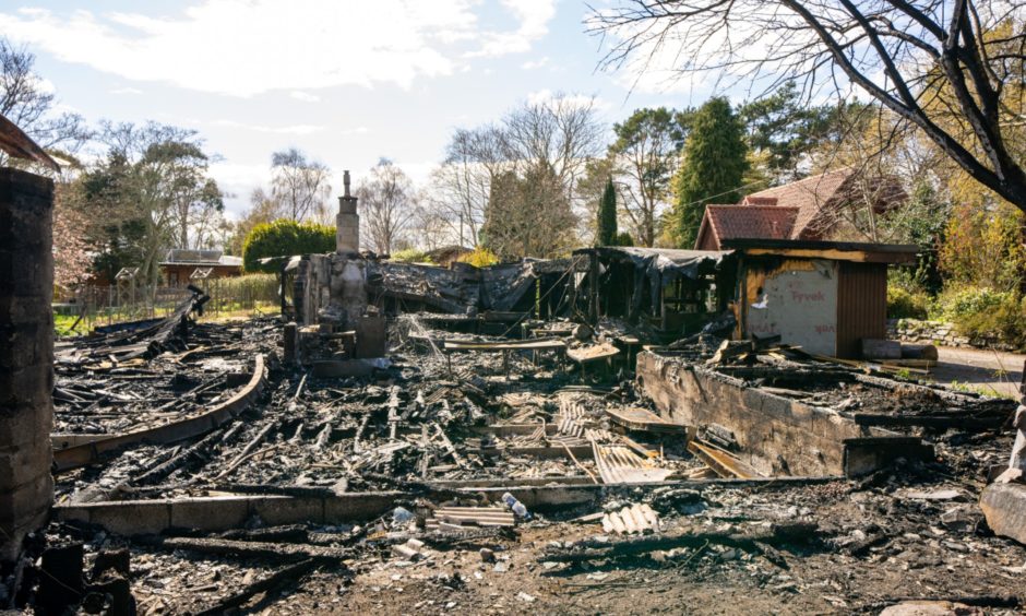 Only charred remains are left of the community centre at the Findhorn Foundation.