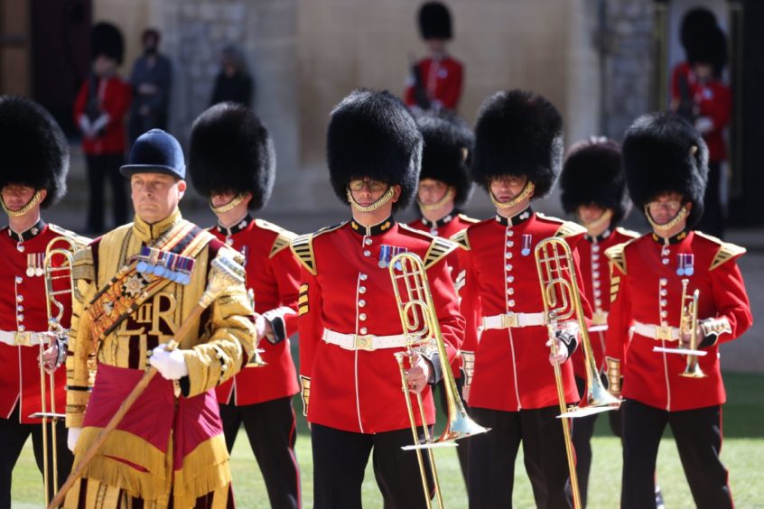 The Foot Guards Band are seen marching in the Engine Court ahead of the funeral of the Duke of Edinburgh in Windsor Castle, Berkshire. Picture date: Saturday April 17, 2021. PA Photo. See PA story FUNERAL Philip. Photo credit should read: Ian Vogler/Daily Mirror/PA Wire