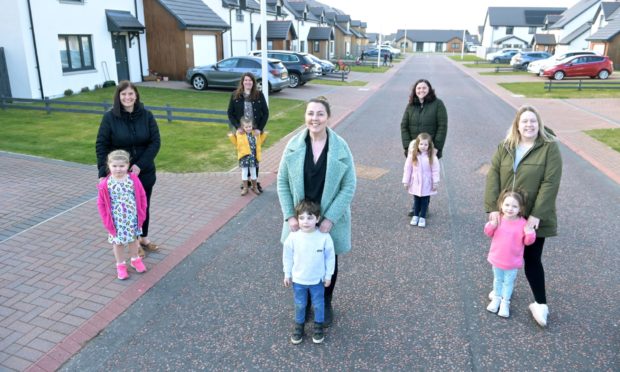 The Findhorn Five (L-R): Lacey MacDonald with Leah, Carol-Ann MacKillop with Martha, Jacqueline Robinson with Louis, Danielle McLeod with Mina and Jan Rogan with Freya.