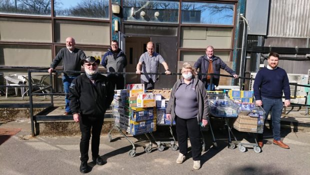 The office bearers from the Lodge of Old Aberdeen drop off the goods at Somebody Cares.