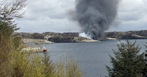 Smoke rising from the crash site of the CHC Super Puma HC225