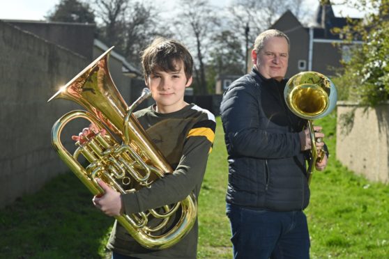 Current Moray Concert Brass member Joshua Toonen and founder Glenn Munro.