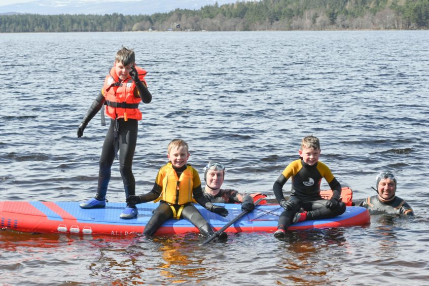 The Allen Family enjoy some playtime on Loch Morlich
Picture by Jason Hedges