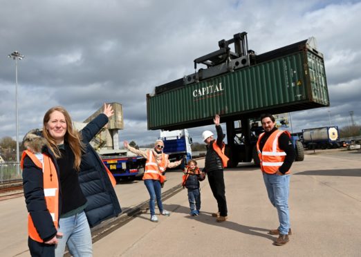 The Greyhope Bay project are finally sending off their big shipping containers away from Altens to Arbroath to be transformed into a visitor centre which will be installed at Torry Battery, where visitors will be able to sit in them and have coffee/watch the dolphins. From left, Fiona McIntyre, Greenwell Chairman Richy Turnbull, daughter and Company Director Julie Turnbull and grandson Robbie, Bryan Gray the Director at Dynamix.  
08/04/21
Picture by KATH FLANNERY