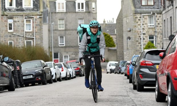 Pictured - Deliveroo driver and Independent Workers Union of Great Britain - communications officer for the courier branch Martin Le Brech.