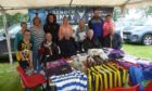 Badenoch Shinty Memories group at an event before the pandemic