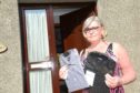 Angie Steel of Peterculter,  who has been told by Debenhams that the only way she can get the money back for the two shirts given as a Christmas present is to return them to England in person as no Scottish shops will be reopening


Picture by Paul Glendell    19/04 /2021