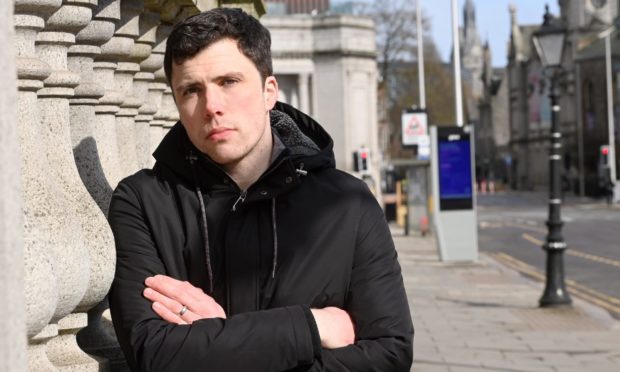 Councillor Ryan Houghton, outside Aberdeen Central Library, where staff could soon take on lifesaving responsibilities of administering naloxone, if the pilot scheme is a success