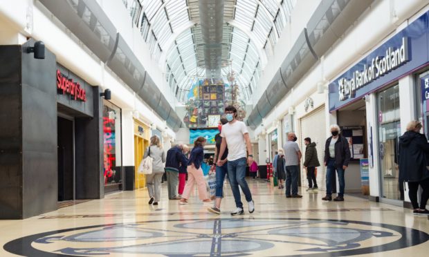 Customers at Eastgate Shopping Centre, Inverness, after shops in Scotland were able to reopen last summer.