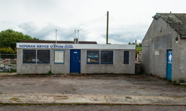 The former garage and petrol station in Hopeman would have been knocked down in the development.