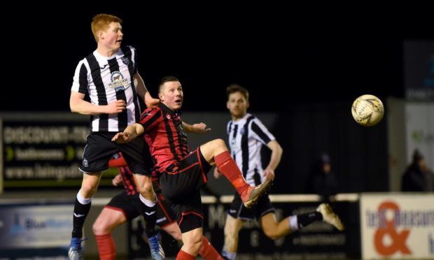 Owen Cairns, left, in action for Fraserburgh