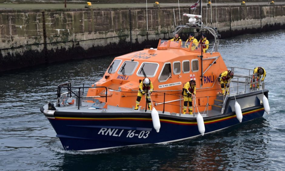 Peterhead lifeboat are currently in attendance.