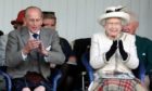 Prince Philip and the Queen at the Braemar Highland Games 2014