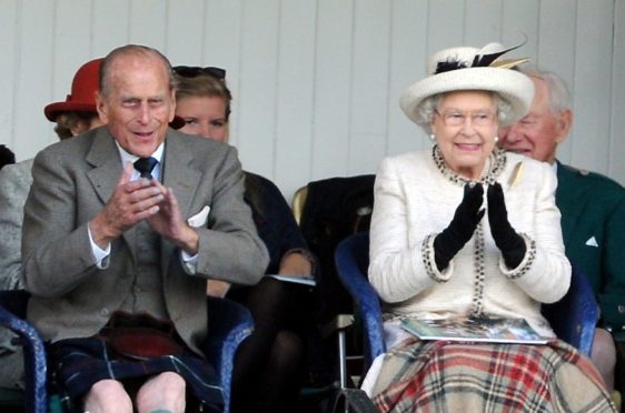 Prince Philip and the Queen at the Braemar Highland Games 2014