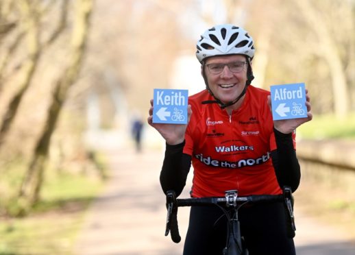 Neil Innes, founder of Ride the North. With cycling signs that will be erected across Aberdeenshire and Moray.

Picture by Scott Baxter    14/04/2021