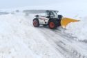 A snowy Highland road
