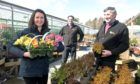 Heidi Bisset, Sandy Munro and Colin Munro, all partners at Munro's Nurseries, are delighted to be open again.