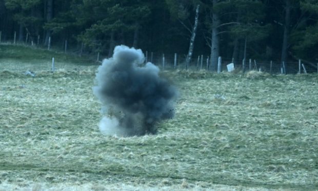 Bomb disposal officers blow up explosive