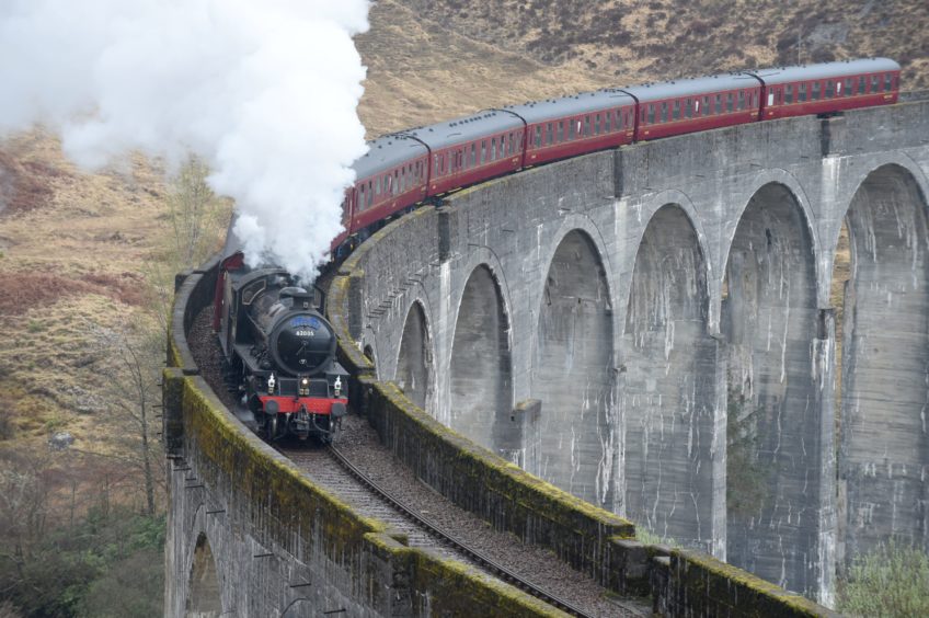 Train on the iconic Glenfinnan Viaduct.