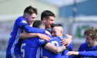 Cove Rangers players celebrate against Falkirk.