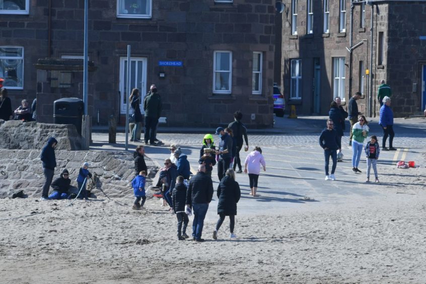People enjoy the sunshine in Stonehaven.
Picture by Chris Sumner.