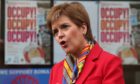 First Minister Nicola Sturgeon. Today night time venues launched a legal challenge against the government's hospitality rules.