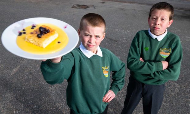 Rhynie School pupils Angus Beverly (left), and William Dibb, 11 (right), have set up a petition against the decision to axe the 'best puddings'