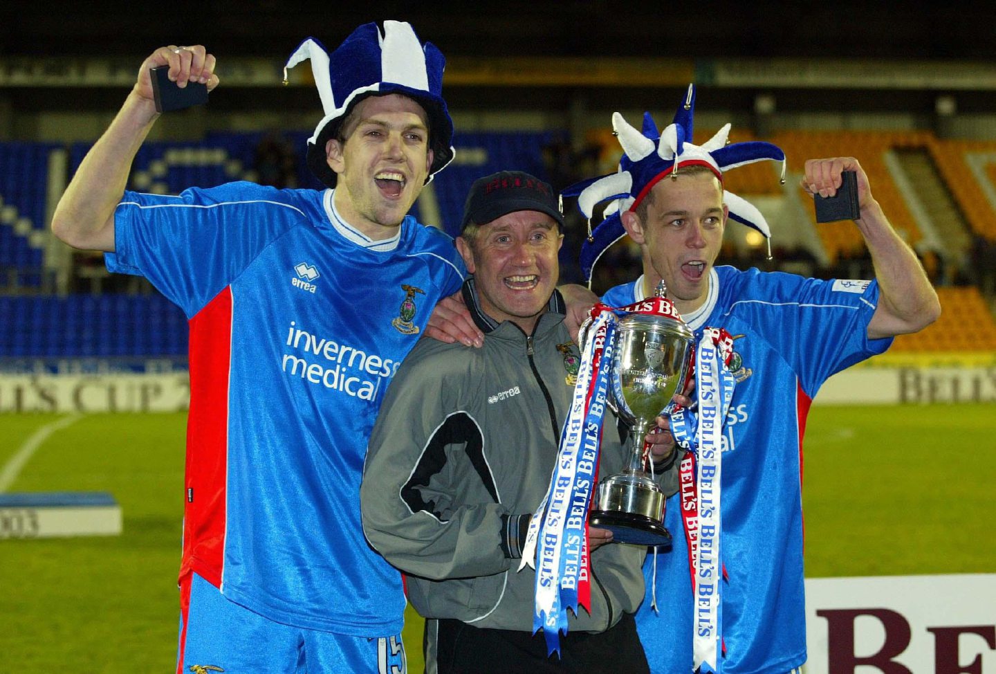 The former Inverness manager John Robertson with goalscorers Steven Hislop and David Bingham after Caley Thistle beat Airdrie United to win the Challenge Cup in 2003.
