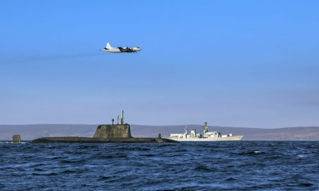 HMS Queen Elizabeth during her recent visit to Glen Mallan.
Vessels and aircraft participating in a previous Joint Warrior.
Joint Warrior - Biannual NATO Exercise

Joint Warrior - Biannual NATO Exercise

An Astute class nuclear submarine in company with the Type 23 frigate HMS Kent being over flown by a German Navy P3 maritime patrol aircraft