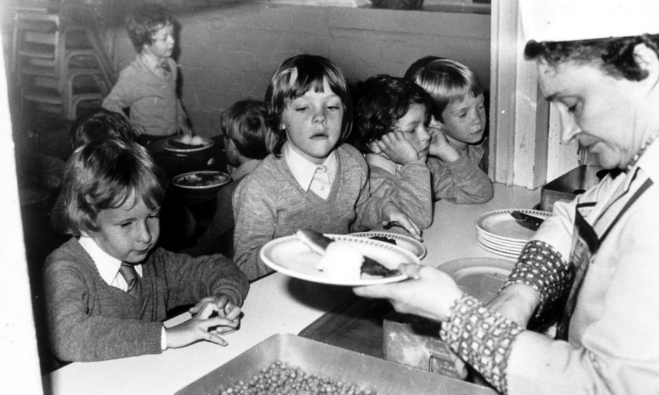 This photo, taken at Ashley Road Primary School in the 80s, is how most of us remember school dinners.