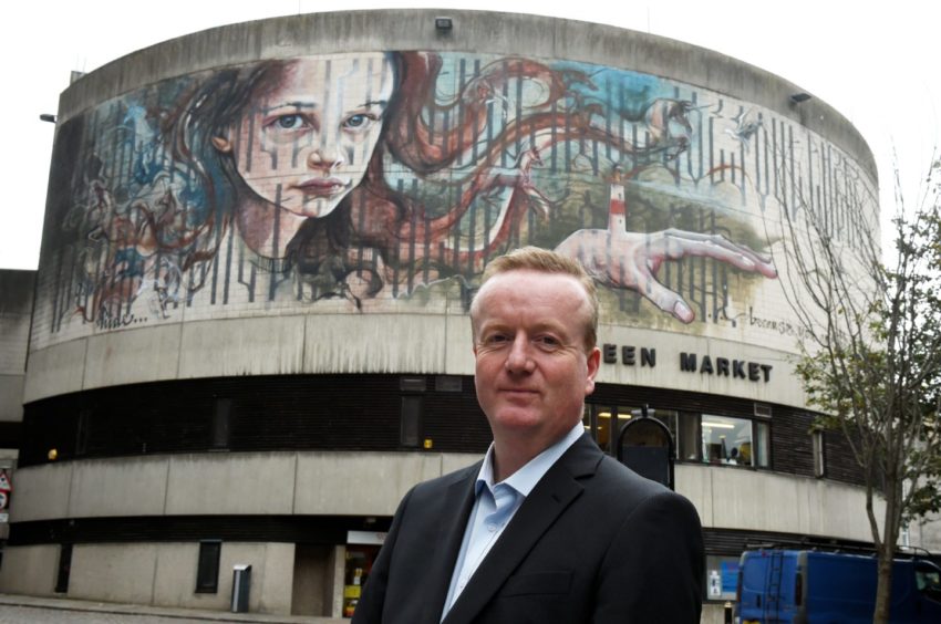 CEO of Aberdeen Inspired Adrian Watson in front of Aberdeen Market.