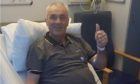 Alba candidate and veteran politician Brian Topping is recovering from a serious illness at Aberdeen Royal Infirmary, and has started campaigning from his bed.