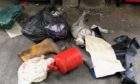 Potentially explosive gas cylinders were discovered in household recycling waste