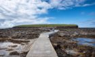 Pedestrian path at low tide to the tidal island Brough of Birsay, close to the St Magnus Way
