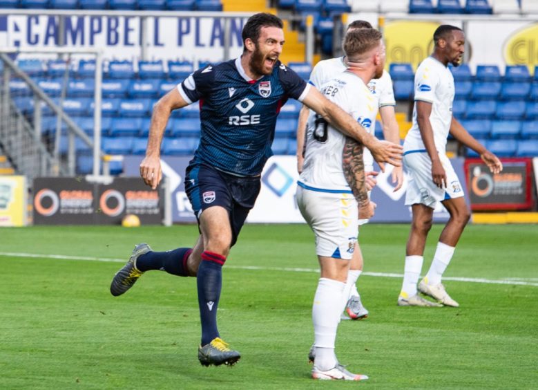 Ross Draper celebrates scoring for Ross County against Kilmarnock.