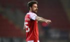 Rotherham United defender Clark Robertson has been linked with a Dons return.