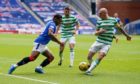 Alfredo Morelos of Rangers tries to get past Scott Brown of Celtic during Sunday's Glasgow derby.