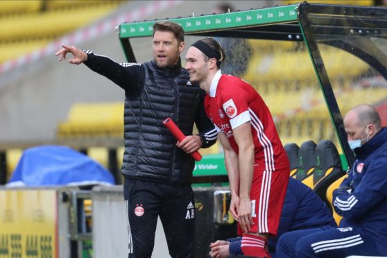 Aberdeen's Ryan Hedges makes his return as a substitute against Livingston.