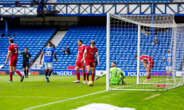 Kemar Roofe of Rangers celebrates scoring the second goal against Aberdeen.