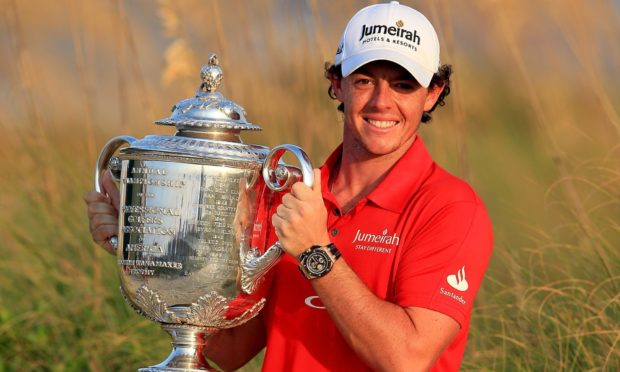 Rory McIlroy holds up the Wanamaker Trophy after winning the 94th PGA Championship at the Ocean Course in 2012.