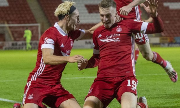 Lewis Ferguson celebrates after scoring against St Mirren.