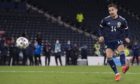 Kenny McLean scores the winning penalty for Scotland against Israel.
