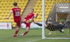 Aberdeen's Callum Hendry scores to make it 1-0 against Livingston.