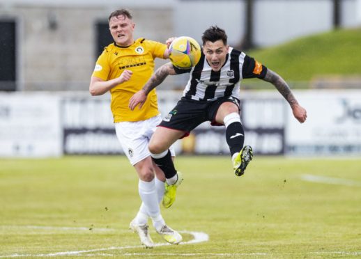 Elgin's Archie MacPhee (right) and Edinburgh's Andy Black.
Photograph by Roddy Scott/SNS Group