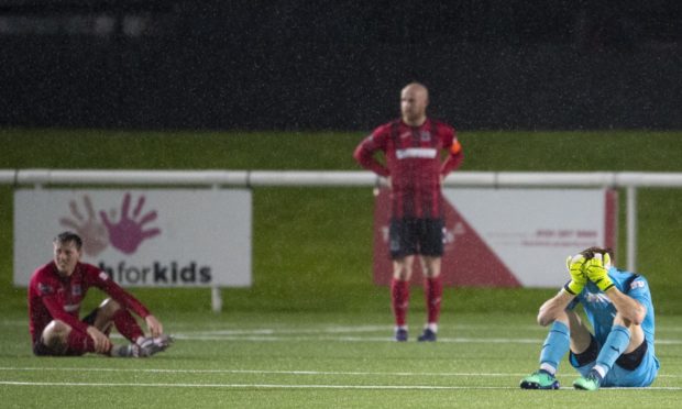 Heartbreak for Elgin City at full-time in Edinburgh. Photograph by Ross Parker/SNS Group