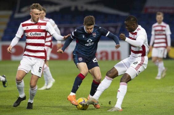 Blair Spittal in action for Ross County against Hamilton.