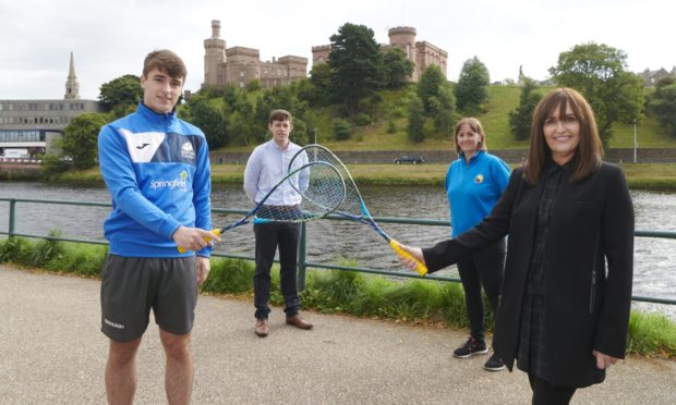 Back-row, left to right: Allan McKay (Head of
Competitions at Scottish Squash), Ailsa Polworth (Inverness Tennis & Squash Club Manager).
Front: Alasdair Prott (Inverness squash player), Joyce Hadden
(Springfield Properties Rep)