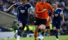 Ross County's Andrew Barrowman (left) gets away from Garry Kenneth in 2010 Scottish Cup final.